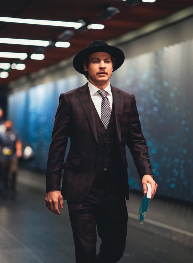 NHL fashion Yanni Gourde wears brown plaid suit and fedora