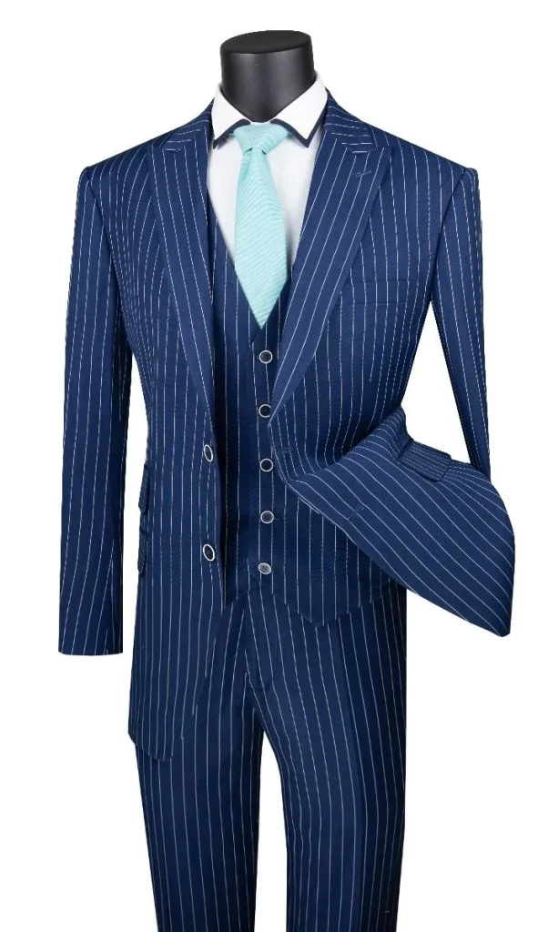 navy blue pinstripe three-piece suit with white shirt and light blue tie