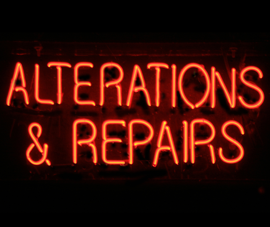 neon sign for suit alterations and repairs